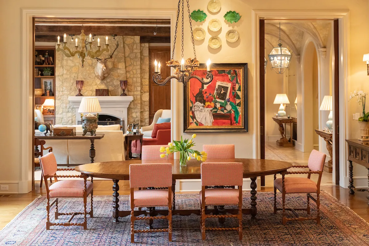 Riverview Residence: a sitting room with tall windows over the river.